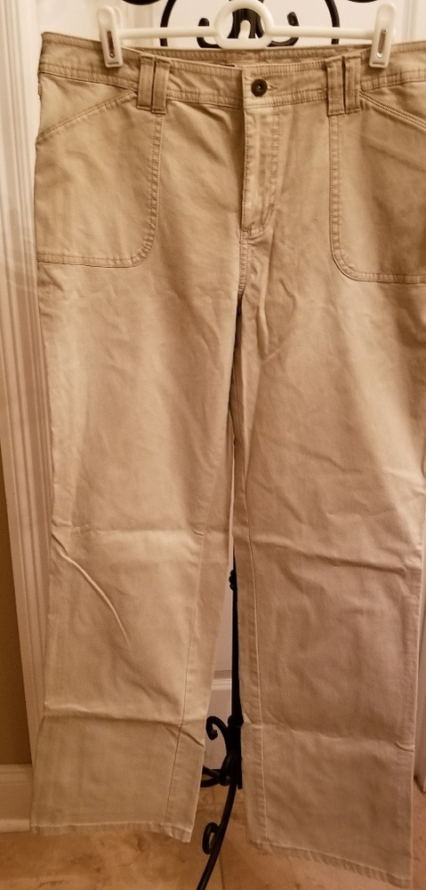 Light beige/cream, straight leg, midrise jeans.